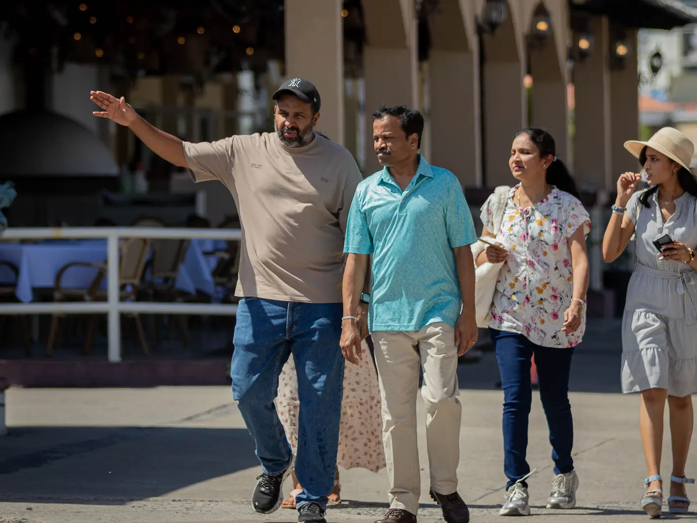Edgar Hernández guides a family around the city